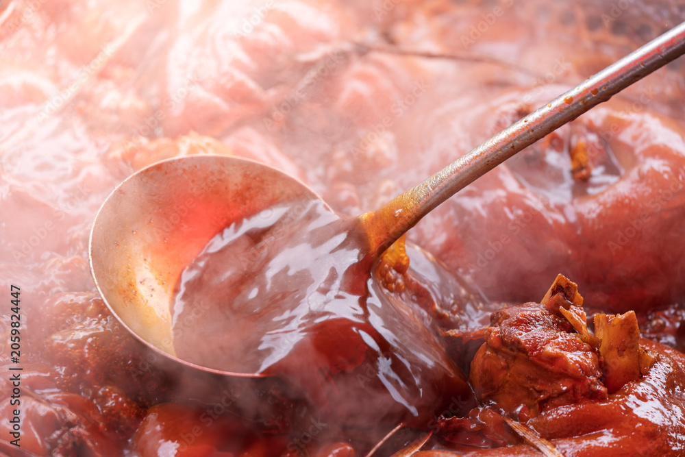 Fototapeta premium steaming delicious braised Chinese pork trotters food