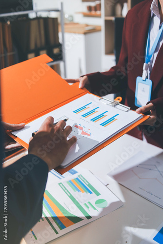 Accounting company provide finance and taxation planning for profitable cash flow, Auditor and accountant team working in office, analyze financial data and accounting record with calculator