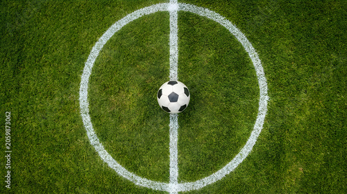 Premium quality professional soccer ball media lush athletic team football background game play stadium visual design sports grass outdoor fitness league on action match