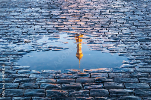 Photography Cupola of Saint Basil cathedral is reflecting in the slop in the Red Square, the center of Moscow
