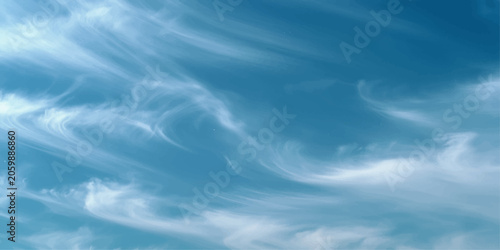 Fotografie Beautiful Blue Sky with White Clouds on a Clear Day