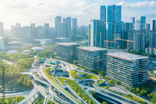 Aerial view of Shenzhen futuristic urban district with green rooftop architecture and modern skyscrapers Sustainable city planning, innovative infrastructure and smart urban development, China