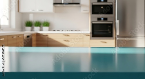 Empty teal countertop with blurred modern kitchen interior background for product display