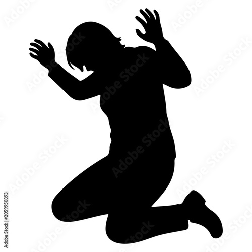 Φωτογραφία Silhouette of a person kneeling in distress.