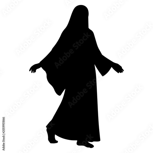 Foto Silhouette of a person in a flowing robe walking.