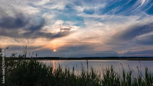Sunset over calm lake landscape