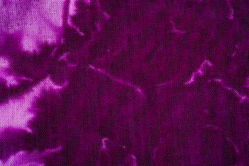 Close up of purple tie dye fabric texture