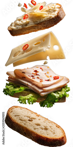 Assorted Cheese and Deli Meat Sandwiches with Fresh Vegetables on Bread