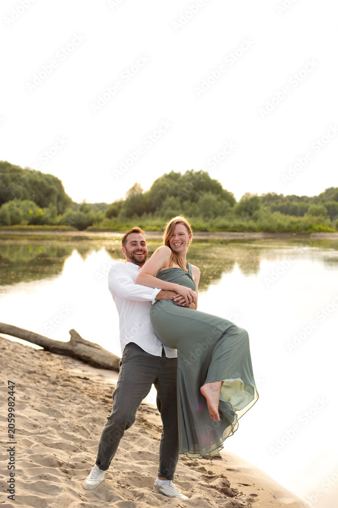 Fototapeta premium Couple in love on the beach