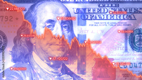 Fotografie Banknote with red decreasing stock market graph chart symbolizing economic reces