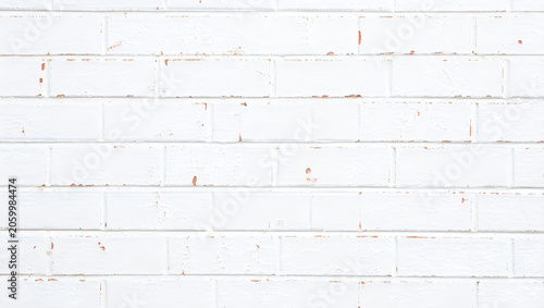 White Painted Brick Wall Texture with Distressed Chipped Paint