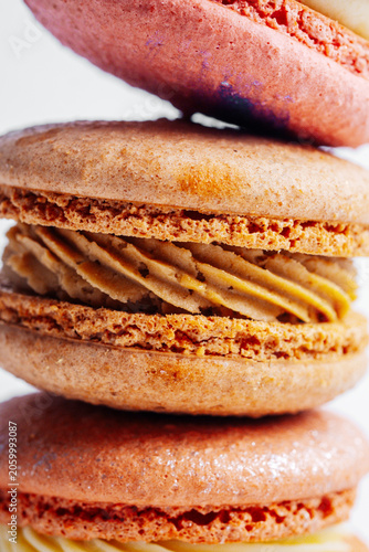 Foto Stack of colorful macarons with cream filling