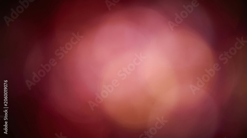 Warm ruby blurry texture making a rich colorful background