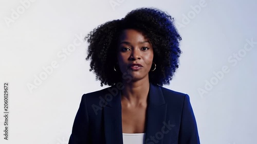 African american businesswoman talking to camera. Professional woman giving presentation. Corporate manager sharing information. Speaker explaining business strategy.