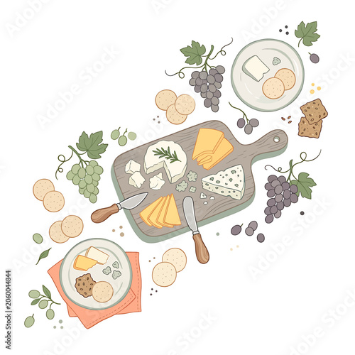 Foto Cheese board with grapes and crackers.