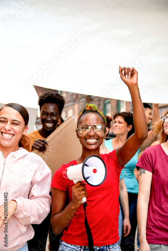 Tableau sur toile Diverse group rallying together photo