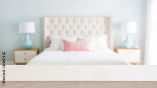 Obraz na płótnie Softly focused bedroom interior featuring a bed and bedside lamps interior headb