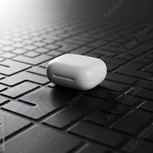Minimalist White Wireless Earbud Charging Case on a Black Textured Background