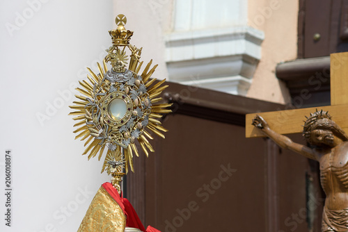 Photography Gold monstrance showing consecrated host during eucharist adoration