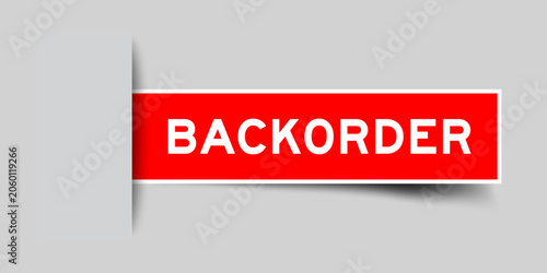 Фотография Red color square shape sticker label with word backorder on gray background