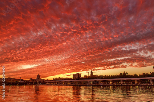 Colorful landscape of the southern coast on the background of magnificent sunset sky, Malaga, Spain