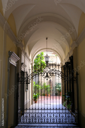 Old building along via Vincenzo Monti in Milan, Italy. Entryway
