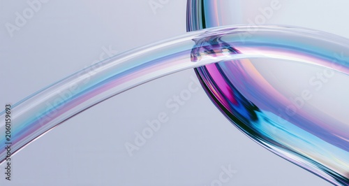 Curved glass structures reflect colors and shapes in a simple design on a smooth background during daylight