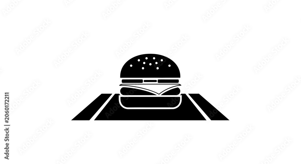 Fototapeta premium Hamburger served on a simple platter represents the fast food industry and casual dining culture as a popular culinary choice for quick meals in modern urban lifestyles and busy environments.