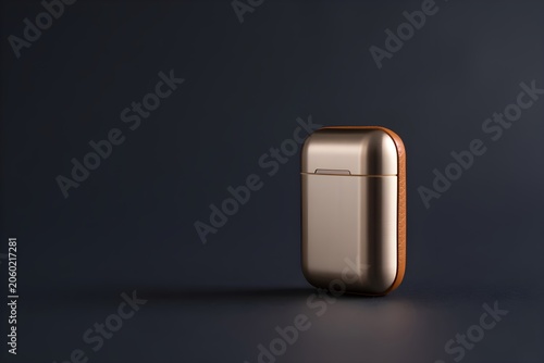 A shiny rose gold metallic object with a leather edge on a dark background