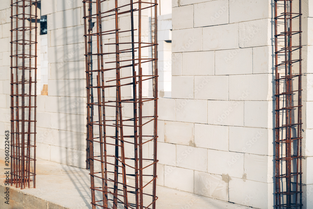 Naklejka premium Reinforcing steel framework prepared for concrete casting in a modern building project. Structural strength, contractor work and construction technology theme.