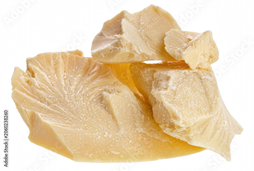 Fotografie Chunks of Raw Organic Cocoa Butter on Dark Surface