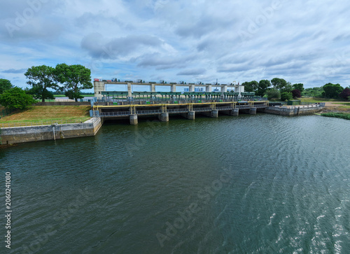 Картината върху платно Aerial view of the Tail Sluice flood defense gate and river barrier on the River