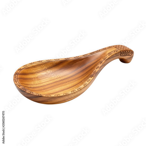 Wooden spoon with carved handle close up view