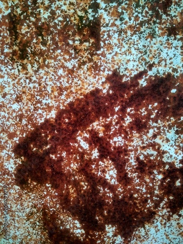 Dark Brown Rust Corrosion and Stains on White Painted Metal Surface Texture 