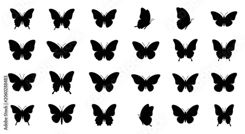 A collection of various black butterflies in different flying positions on a white background