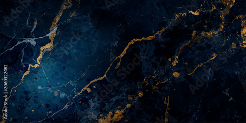Luxurious deep navy blue marble texture background with elegant metallic gold veining patterns for premium abstract natural interior designs and rich wallpapers.