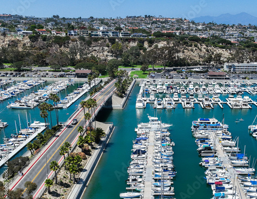 The Dana Point California  Harbor from above the Richard Henry Dana Statue using a UAV Drone looking at the harbor