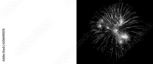 Fotografia Monochrome fireworks display on black background, white firework burst in night