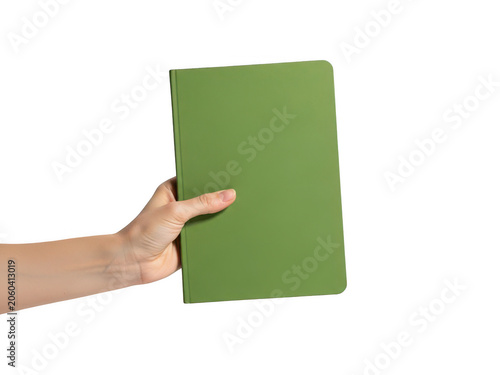 Hand holding green notebook or folder