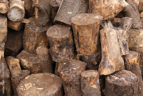Rustic pile of dry firewood for winter heating