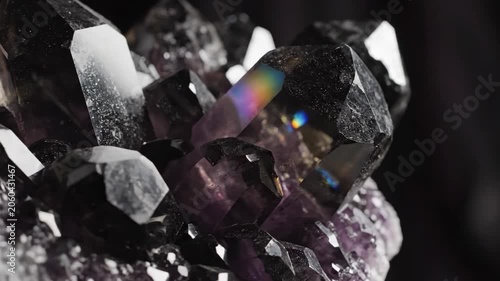 Close-up of Amethyst Geode Crystals with Stunning Light Refractions.
