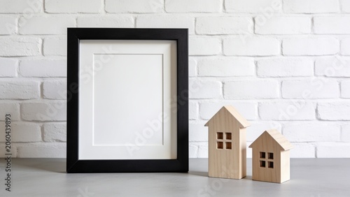  features a minimalist and modern style with a simple layout. It shows a black-framed square picture frame with a white interior,