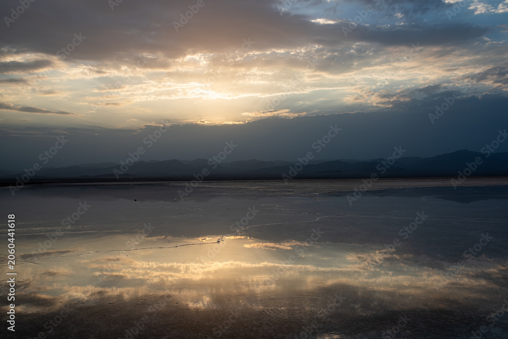 Fototapeta premium Spectacular sunset reflection on the Danakil salt flat