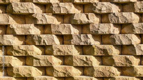 Konstfotografi Aligned geometric stone retaining wall background texture