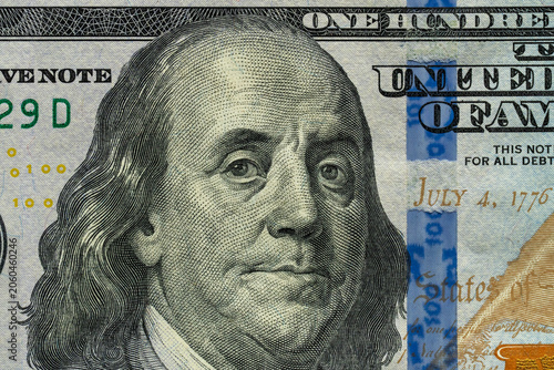Принти на полотні Macro Detail of Benjamin Franklin Portrait on US Dollar Banknote