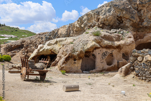 Ancient Rock Formations and Cart in Cappadocia