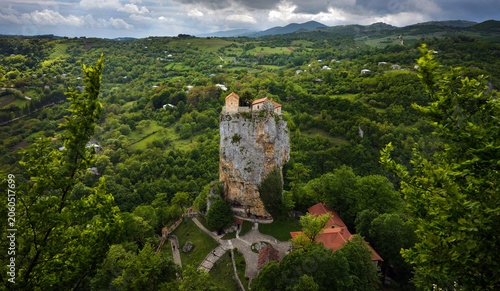 Katskhi Pillar Rising Above Lush Green Landscape in Georgia