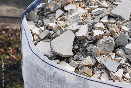 Fotografie Construction rubble collected in large industrial bag