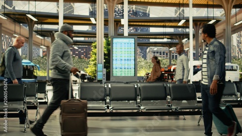 Busy bus station platform with travelers preparing for intercity long-haul trip, Passengers carrying carry-on trolley bags checking departure board timetable.