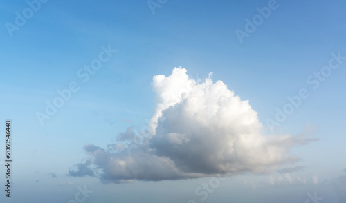 Obraz na plátně One big white cloud in blue sky over sea landscape